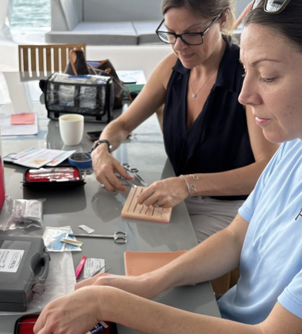Dr. Julie Kollar leading hands-on clinical training with a Trove system